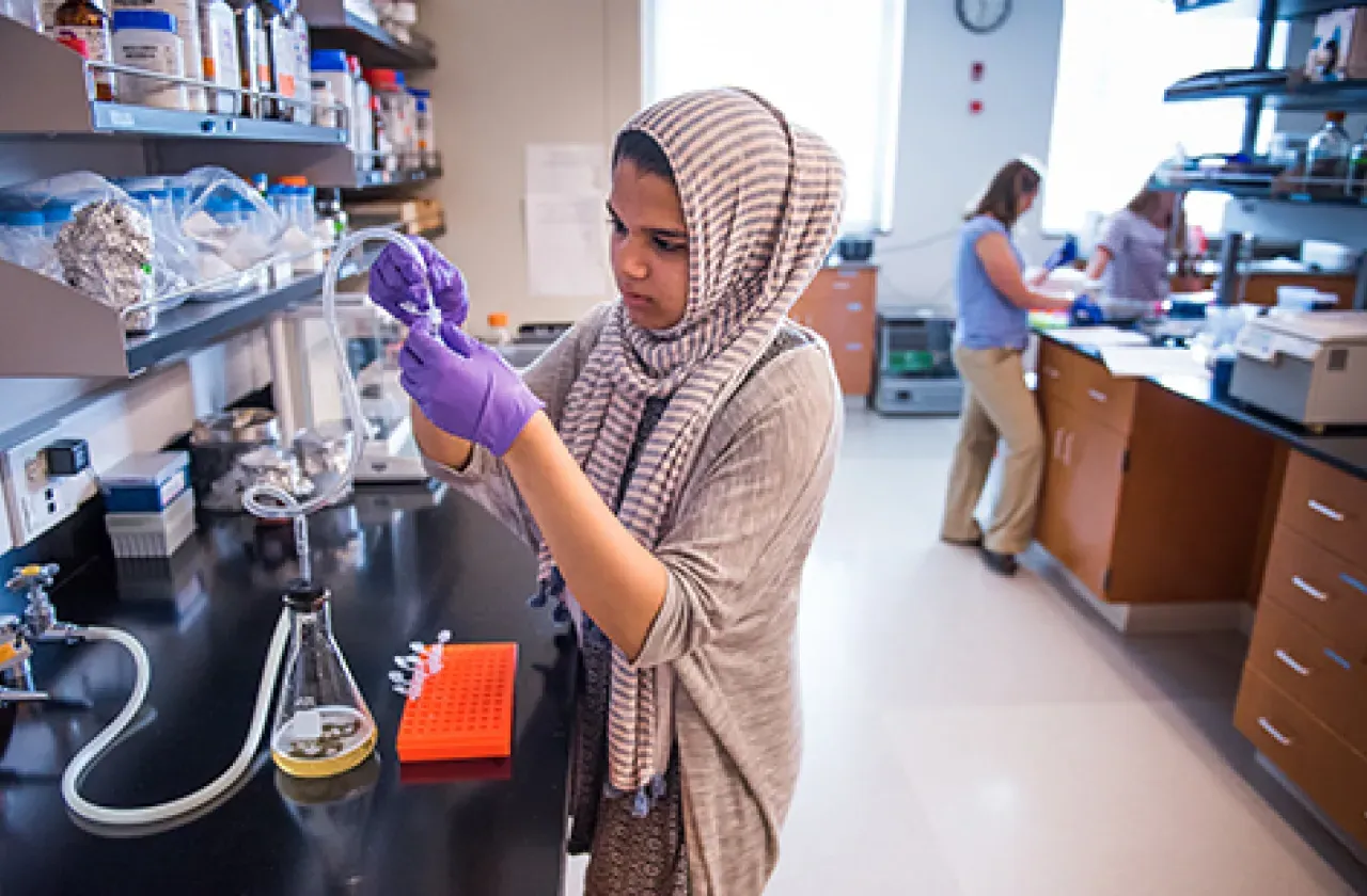 Student working in Ford Hall lab